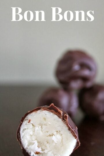 This Coconut Bon Bons Recipe is perfect for the holidays. Candied creamy coconut with bits of walnuts rolled into a ball then dipped in chocolate.