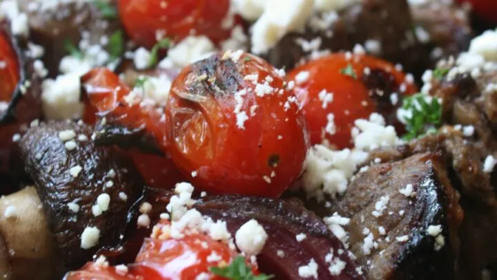 Beef Kabobs with blistered tomatoes and feta cheese.