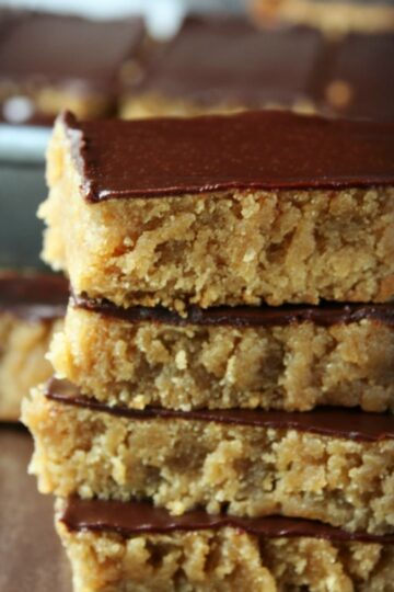 Chocolate Peanut Butter Bars are a delightful cake-like cookie bar that is soft and will melt in your mouth. Topped with a thin layer of chocolate glaze for just the right amount of richness.