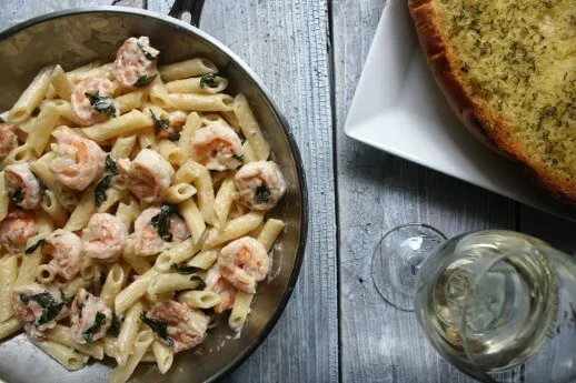 Creamy Lemon Basil Shrimp Pasta recipe. Buttery, garlicky shrimp tossed in a creamy basil wine sauce and pasta. This dinner for 2 is ready in 30 mins.