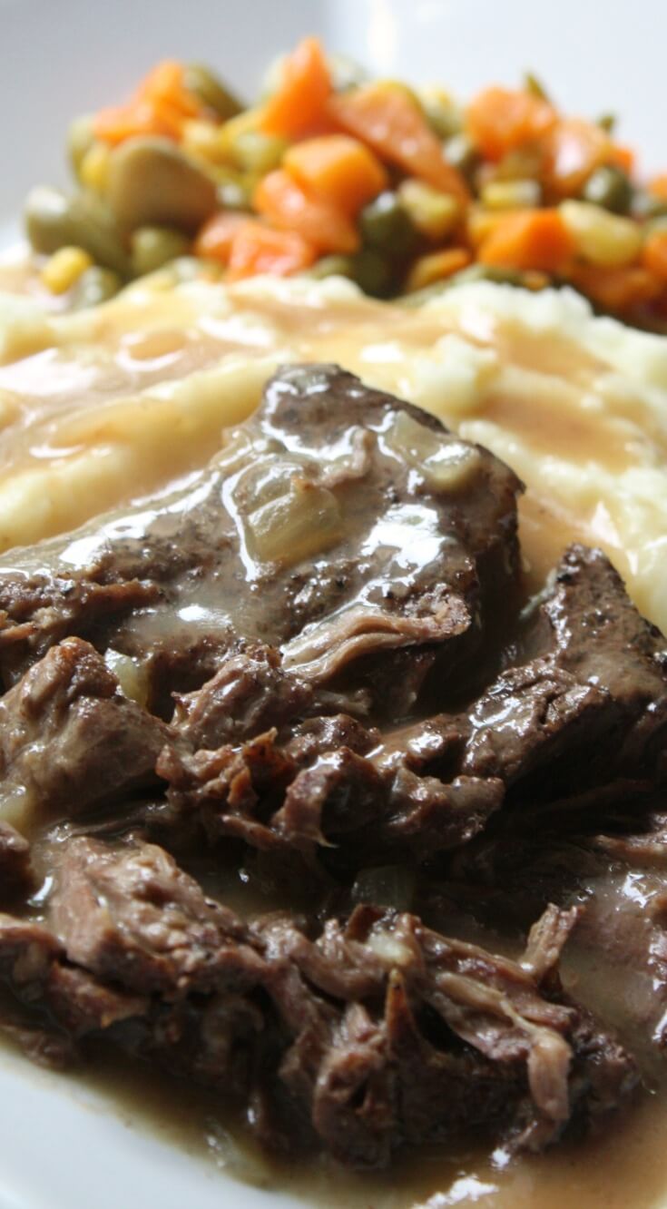 Slow Cooker Sirloin Steak with Gravy Recipe. Fork tender sirloin steak served with buttery mashed potatoes and covered in gravy.