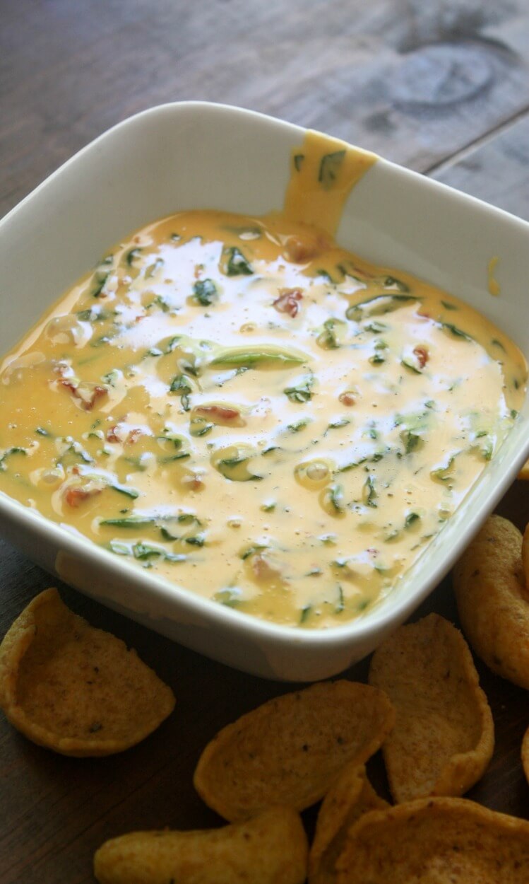 10 Super Cheesy Dips including this Slow Cooker Spinach Dip.