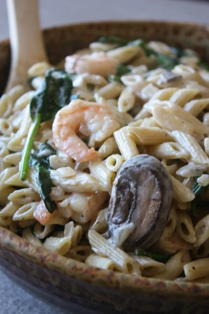 Creamy Shrimp Spinach Pasta with Mushrooms. Easy seafood pasta dish that is creamy and delicious. 