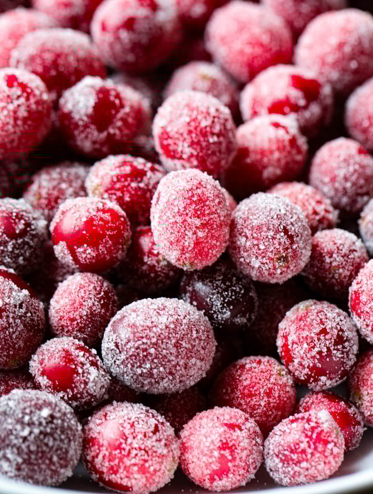 Frosted fresh berries with sugar crystals, perfect for desserts or snacking.